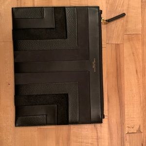 Black suede, haircalf, pebbled leather and smooth leather envelope with zipper